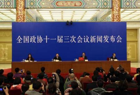 Zhao Qizheng (2nd, R), spokesman of the Third Session of the 11th Chinese People's Political Consultative Conference (CPPCC) National Committee, speaks during a news conference on the CPPCC session at the Great Hall of the People in Beijing, capital of China, March 2, 2010. (Xinhua/Ding Lin)