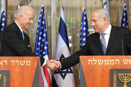 Israeli Prime Minister Benjamin Netanyahu (R) shakes hands with visiting U.S. Vice President Joe Biden during a joint statement at Netanyahu's residence in Jerusalem, March 9, 2010. (Xinhua/GPO)