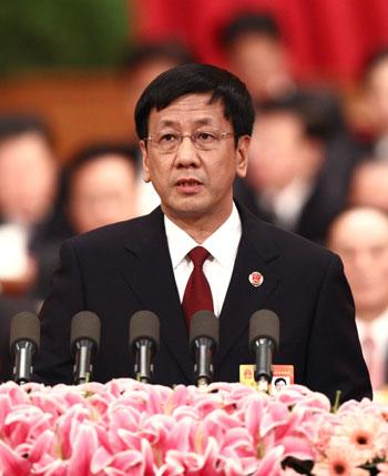 China's Procurator-General Cao Jianming delivers a report on the work of the Supreme People's Procuratorate during the fourth plenary meeting of the Third Session of the 11th National People's Congress (NPC) at the Great Hall of the People in Beijing, capital of China, March 11, 2010. (Xinhua/Yao Dawei)