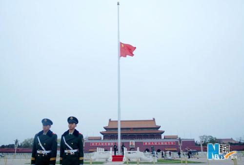 Flag on Tian'anmen Square at half-mast to mourn quake dead.