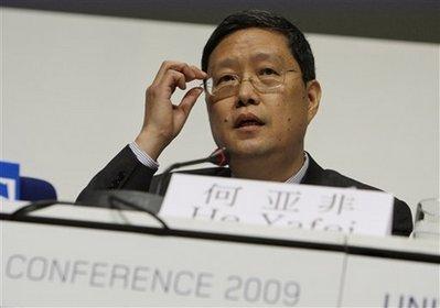 He Yafei, Chinese Vice Minister of Foreign Affairs gestures during a press conference at the UN Climate summit in Copenhagen, Denmark, Friday, Dec. 11, 2009. Negotiators are working in Brussels and Copenhagen to come up with more climate change money for poor countries amid talks on a historic deal to control the world's greenhouse gases.(AP Photo/Anja Niedringhaus) 