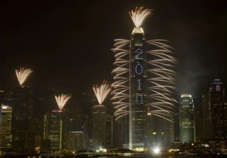 Thousands of people crowded onto Hong Kong's waterfront to see in 2010 which was ushered in with a trademark firework display. 