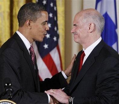 U.S. President Barack Obama shakes hands with Prime Minister George Papandreou of Greece after remarks at a reception in the East Room of the White House in Washington, Tuesday, March 9, 2010. (AP Photo/Alex Brandon)