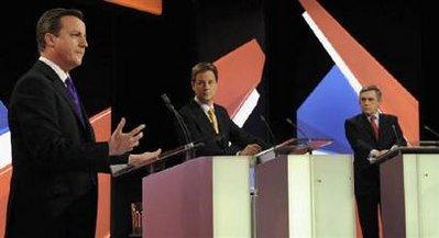 Britain's Prime Minister Gordon Brown (R), opposition Conservative Party leader David Cameron (L) and Liberal Democrat leader Nick Clegg take part in the second of Britain's leadership election debates, in Bristol, southwest England April 22, 2010.REUTERS