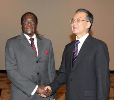 Chinese Premier Wen Jiabao (R) meets with Zimbabwean President Robert Mugabe in Sharm el-Sheikh, Egypt, on Nov. 7, 2009. (Xinhua/Yao Dawei (Xinhua/Yao Dawei)