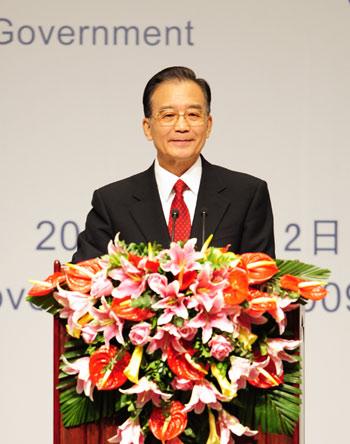 Chinese Premier Wen Jiabao addresses the opening ceremony of the 7th World Expo 2010 Shanghai China Forum in Beijing, capital of China, Nov. 12, 2009.(Xinhua/Zhang Duo)