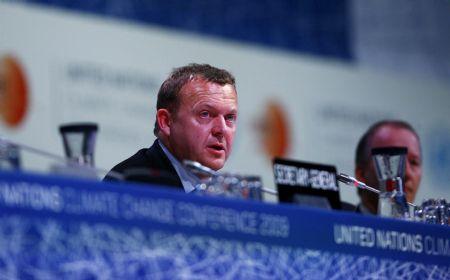 Denmark's Prime Minister Lars Lokke Rasmussen attends a night plenary meeting at the United Nations Climate Change Conference (COP15) at the Bella Center in Copenhagen, December 19, 2009. The UN climate change conference failed to adopt the Copenhagen Accord on Dec. 19.(Xinhua/Zhang Yuwei)