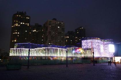 Photo taken on Jan. 22, 2010 shows the exterior view of the Pavilion of private enterprises in Shanghai, east China during a lighting ceremony. A lighting and completion ceremony of the major projects for the "Energetic Matrix", the pavilion of private enterprises during the 2010 Shanghai World Expo, was held here on Friday. This is the first time that private enterprises have their own pavilion during the 150 year history of the World Exposition. (Xinhua/Pei Xin)