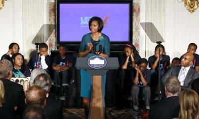 U.S. First lady Michelle Obama announces a campaign to combat the rapidly growing problem of childhood obesity, Tuesday, Feb. 9, 2010, in the State Dining Room of the White House in Washington. (Xinhua/Reuters Photo)