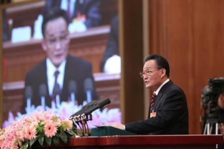 Wu Bangguo, chairman of the Standing Committee of the National People's Congress (NPC), delivers a work report of the Standing Committee of the NPC during the third plenary meeting of the Third Session of the 11th NPC at the Great Hall of the People in Beijing, capital of China, March 9, 2010. (Xinhua/Ju Peng)