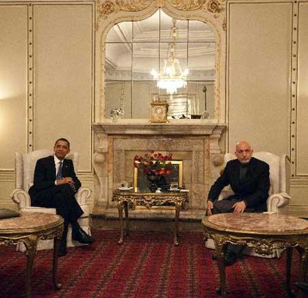 U.S. President Barack Obama (L) meets with Afghan President Hamid Karzai at the Presidential Palace in Kabul, capital of Afghanistan, March 28, 2010. (Xinhua/Ahmad Masood, Pool)