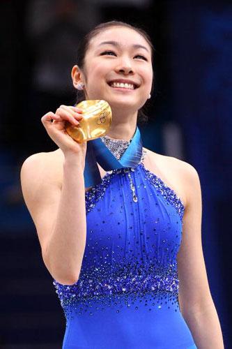 In the women's figure skating final, Kim Yu-na produced a riveting free skate to become the first South Korean to win an Olympic figure skating gold medal.