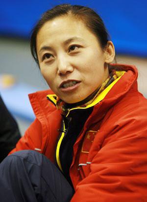 Head coach Li Yan led the squad to a grand slam finish, but it's only the lastest item on a long list of career accomplishments. 