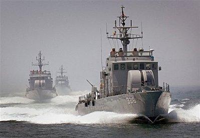 This undated photo released by the South Korea Navy shows high-speed patrol boats armed with canons and machine guns. A NKorean patrol boat was set ablaze after exchanging fire with SKorea's navy on Tuesday, Seoul officials said, as cross-border tensions rose a week before a US presidential visit.