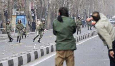 Iranian protestors and police forces clash clash in central Tehran December 27, 2009.