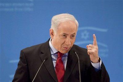 Israeli Prime Minister Benjamin Netanyahu speaks during a meeting with the foreign press in Jerusalem, Wednesday, Jan. 20, 2010. (AP Photo/Bernat Armangue)