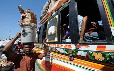 Vendors sell snacks to passengers at a bus station in Port-au-Prince. Haiti's desperate earthquake survivors faced a new threat Friday as the United Nations reported a rise in cases of diarrhea, measles and tetanus in squalid tent camps for victims.(AFP/Thony Belizaire)