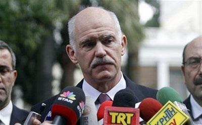 Prime Minister George Papandreou speaks to reporters after meeting President Karolos Papoulias in central Athens, Greece, on Wednesday, March 3, 2010. (AP Photo/Petros Giannakouris)