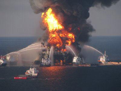 This image provided by the U.S. Coast Guard shows fire boat response crews battle the blazing remnants of the off shore oil rig Deepwater Horizon Wednesday April 21, 2010. (AP Photo/US Coast Guard)