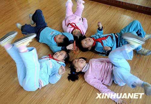 The quintuplets pictured together at the Experimental Primary School in Fengtai District, Beijing.