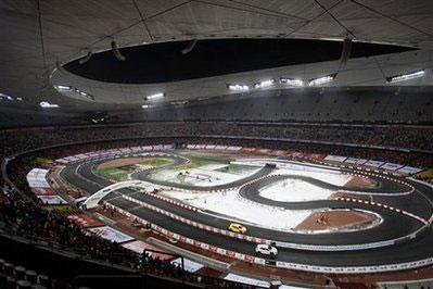 Chinese celebrities take part in the Race of Champions Beijing 2009 in Beijing, China, Monday, Nov. 2, 2009. The Race of Champions is an international motorsport event featuring some of the world's best racing and rally drivers from different disciplines, including World Rally, Formula One and NASCAR, competing head to head using identical cars.(AP Photo/Ng Han Guan)