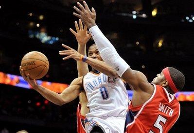 Oklahoma City Thunder's Russell Westbrook (0) goes to the basket against Atlanta Hawks' Josh Smith (5) in the fourth quarter of an NBA basketball game in Atlanta, Monday, Jan. 18, 2010. The Thunder won 94-91.(AP Photo/Rich Addicks)