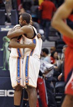 Oklahoma City Thunder's Kevin Durant, left, and teammate Serge Ibaka embrace after the Thunder's 94-91 win over the Atlanta Hawks in an NBA basketball game in Atlanta, Monday, Jan. 18, 2010.(AP Photo/Rich Addicks)