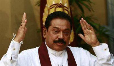 Sri Lanka's President Mahinda Rajapaksa gestures during a meeting with the international media in Colombo January 27, 2010. REUTERS/Andrew Caballero-Reynolds/Files