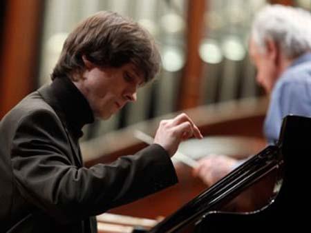 Rafal Blechacz smiles as he plays during a rehearsal of the 200th Anniversary of Fryderyk (Frederic) Chopin's Birthday Special Concert at the Warsaw Philharmonic concert hall February 22, 2010. Poland is celebrating the 200th anniversary of the composer's birthday. (Kacper Pempel/Reuters) 