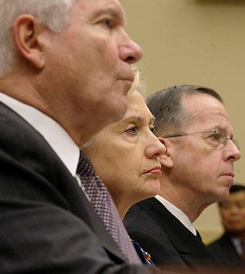 U.S. Defense Secretary Robert Gates, Secretary of State Hillary Rodham Clinton and Joint Chiefs of Staff Chairman Adm. Mike Mullen (L-R) testify at a House of Representatives Foreign Affairs Committee hearing on the Afghanistan war on Capitol Hill in Washington D.C., capital of the U.S., Dec. 2, 2009. Gates said during his testimony on Wednesday that "failure in Afghanistan would mean a Taliban takeover" and it would "have severe consequences for the United States and the world." (Xinhua/Zhang Yan)