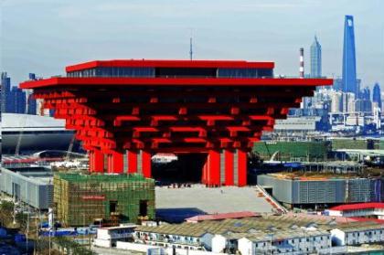 Photo taken on Dec. 6, 2009 shows the China Pavilion in the World Expo Park in Shanghai, east China. The construction of the Shanghai Expo site is making rapid progress and more pavilions take on shape.(Xinhua/Guo Changyao)