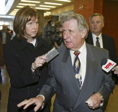 Calgary Herald reporter Michelle Lang talks with Alberta Premier Ralph Klein in this March 7, 1995 file photo, released to Reuters on December 30, 2009. According to local media reports, Lang and four Canadian soldiers were killed by an improvised explosive device in Afghanistan on Wednesday. She was covering the war for the Canwest News Service.(Xinhua/Reuters File Photo)