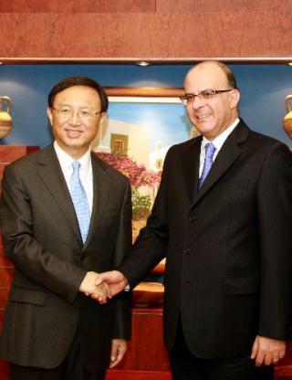 Visiting Chinese Foreign Minister Yang Jiechi (L) meets with Cyprus' parliament speaker Marios Karoyian in Nicosia, capital of Cyprus, on Feb. 1, 2010. (Xinhua/Wang Qiang)