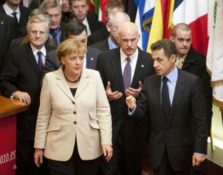 German Chancellor Angela Merkel (Front L), Greek Prime Minister Georgios Papandreou (C) and French President Nicolas Sarkozy (Front R) leave the EU Council building after a meeting in Brussels, capital of Belgium, Feb. 11, 2010. An informal summit of European Union leaders on Thursday, originally called to work on a new economic strategy for the next decade. (Xinhua/Thierry Monasse)