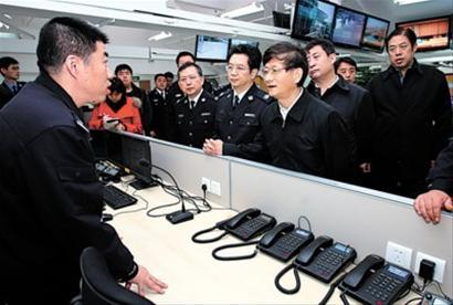 State Councilor and Minister of Public Security Meng Jianzhu inspects security preparations within the Expo site. 