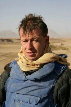 A picture released by Trinity Mirror shows Rupert Hamer, defence correspondent for the Sunday Mirror newspaper, in the Helmand Province in Afghanistan, 2007. (AFP/TRINITY MIRROR/Philip Coburn)