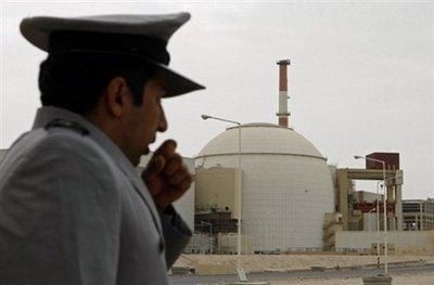 An Iranian security guard watches over the nuclear reactor in Bushehr. Russia said it expects Iran to agree to enrich uranium abroad under the supervision of the International Atomic Energy Agency (IAEA) (AFP/File/Behrouz Mehri)