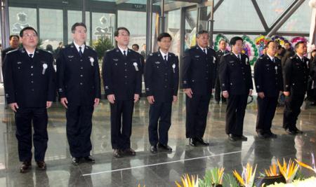 While waiting for the peacekeepers' bodies to return home, hundreds of their fellows have attended a memorial service in Beijing.