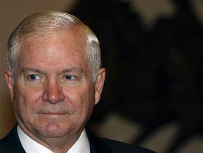 U.S. Defense Secretary Robert Gates poses for photographers before talks with Turkish Defense Minister Vecdi Gonul, unseen, in Ankara, Turkey, Saturday, Feb. 6, 2010. (AP Photo/Burhan Ozbilici)