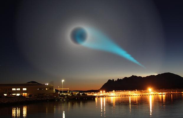 An eerie turquoise light spotted over Norway sparked a mystery, with suggestions it could be a missile test. The light was photographed by Jan Petter Jorgensen while he was on his way to work at a salmon factory