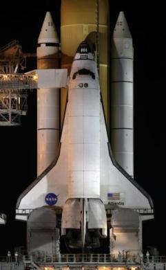 The space shuttle Atlantis sits on launch pad 39A as workers prepare the craft for launch at the Kennedy Space Center in Cape Canaveral, Florida November 15, 2009. Atlantis is scheduled for launch on November 16 on a supply mission to the International Space Station(Xinhua/Reuters Photo)