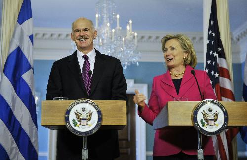 U.S. Secretary of State Hillary Clinton (R) and visiting Greek Prime Minister George Papandreou attend a press conference in Washington D.C., capital of the United States, March 8, 2010.(Xinhua/Zhang Jun)