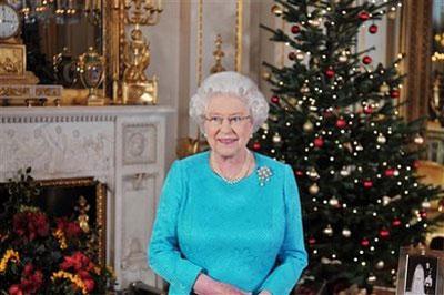 In this image made available in London Wednesday Dec. 23, 2009, Britain's Queen Elizabeth II poses prior to the recording of her annual Christmas Day broadcast to the Commonwealth, in the White Drawing Room at Buckingham Palace in London, Thursday Dec. 20, 2009.(AP Photo/John Stillwell, pool)