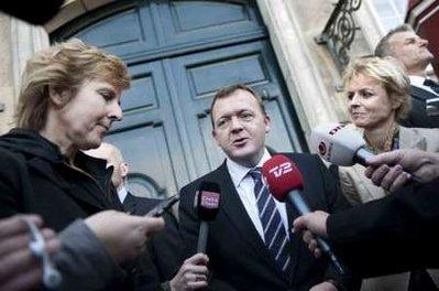 Danish Prime Minister Lars Lokke Rasmussen (C) presents his new Climate- and Energy minister Lykke Friis (R) and current minister for the upcoming climate summit in Copenhagen, COP15, Connie Hedegaard, outside the Royal Palace of Amalienborg in Copenhagen November 24, 2009, after the presentation to Danish Queen Margrethe. Connie Hedegaard was at the same time appointed new EU commissioner.REUTERS/Scanpix/Jens Norgaard