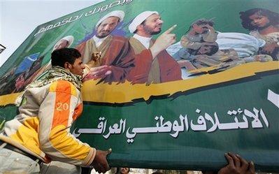 Workers install a campaign poster for candidate Sheikh Sabah al-Saadi, a candidate with the Iraqi National Coalition, in Baghdad, Iraq, Friday, Feb. 12, 2010. Iraq has officially kicked off the election season ahead of the March nationwide vote. Campaign posters were plastered across Baghdad and other cities on Friday, urging people to the polls. (AP Photo/ Hadi Mizban) 