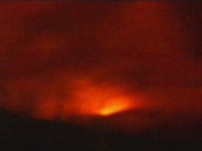 This frame grab from APTN shows the volcano near the Eyjafjallajoekull glacier, the fifth largest glacier in Iceland, as it begins erupting early Sunday morning March 21, 2010. Fearing flooding from the glacier melt, authorities evacuated some 400 people in the area 160 kilometers (100 miles) southeast of the capital, Reykjavik, as a precaution but no damage or injuries have been reported according to authorities. The last time the volcano erupted was in the 1820s. (AP Photo/APTN) 