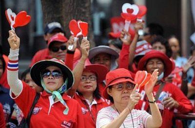 "Red Shirt" supporters of ousted Thai premier Thaksin Shinawatra shout slogans during anti-government protests in Bangkok. (AFP/Pornchai Kittiwongsakul)