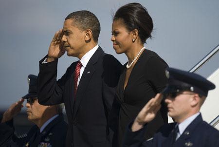 U.S. President Barack Obama, accompanied by his wife Michelle Obama, participates in a memorial service on November 10, 2009 at the Fort Hood Army base, Texas, to honor 13 people killed by a U.S. Army psychiatrist.(Xinhua/AFP Photo)