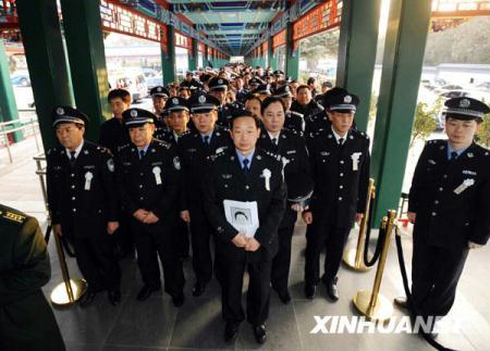 Mourners arrive to bid farewell to the eight peacekeeping police officers at the Babaoshan Revolutionary Cemetery in Beijing, China, Jan. 20, 2010. A farewell ceremony for the eight peacekeeping police officers killed in last week's earthquake in Haiti was held on Wednesday morning in Beijing. (Xinhua/Li Tao)