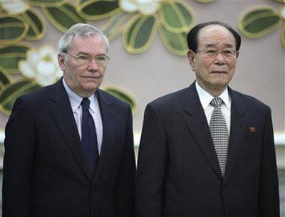 U.N. political chief B. Lynn Pascoe, left, poses for a photo with Kim Yong Nam, president of the Presidium of the Supreme People's Assembly, which is DPRK's parliament, before talks in Pyongyang, Thursday, Feb. 11, 2010. (AP Photo/APTN)